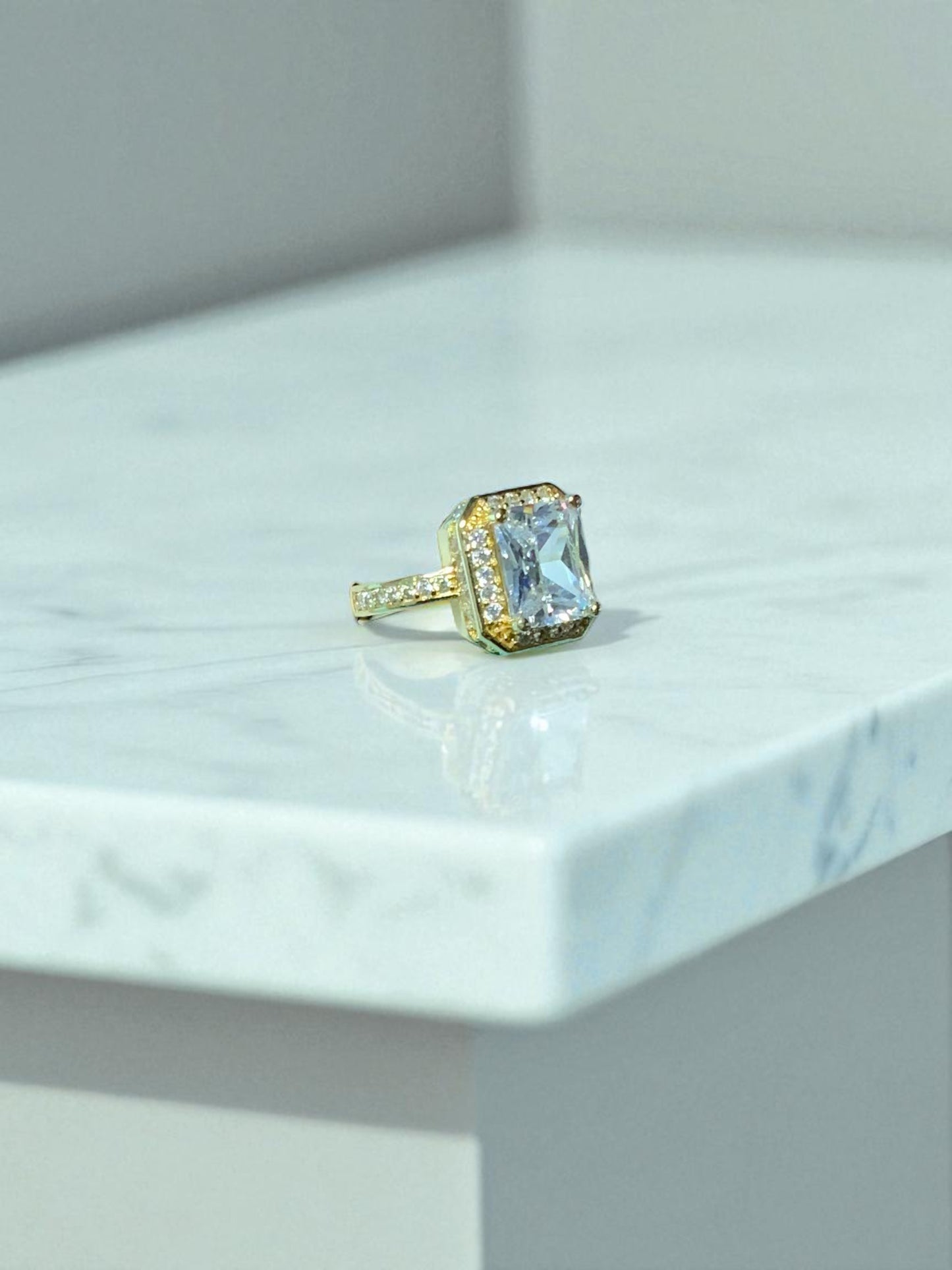 ROYAL RADIANCE EMERALD CUT CRYSTAL GOLD RING